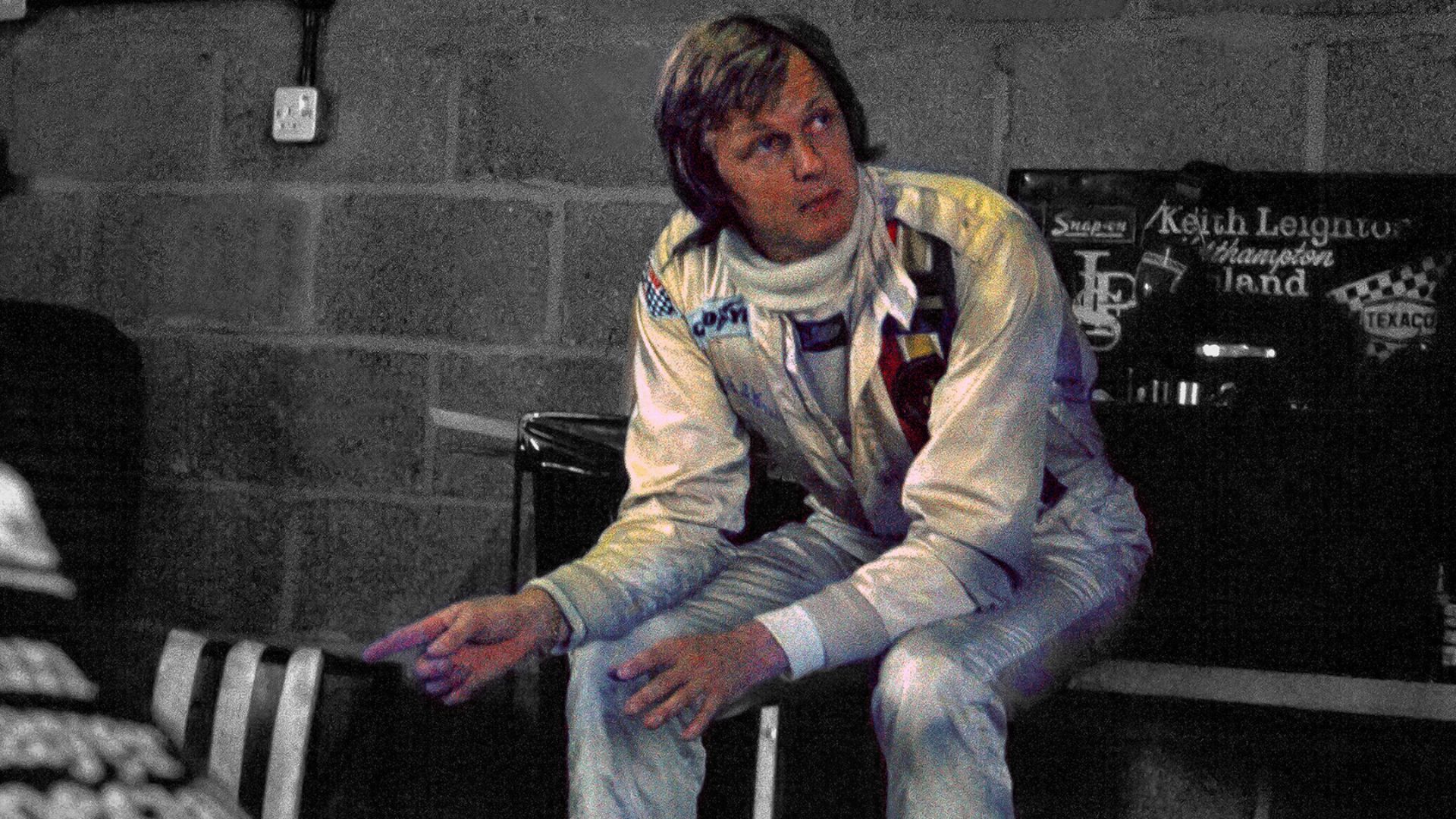 Ronnie Peterson in Pit Garage discussing his Lotus