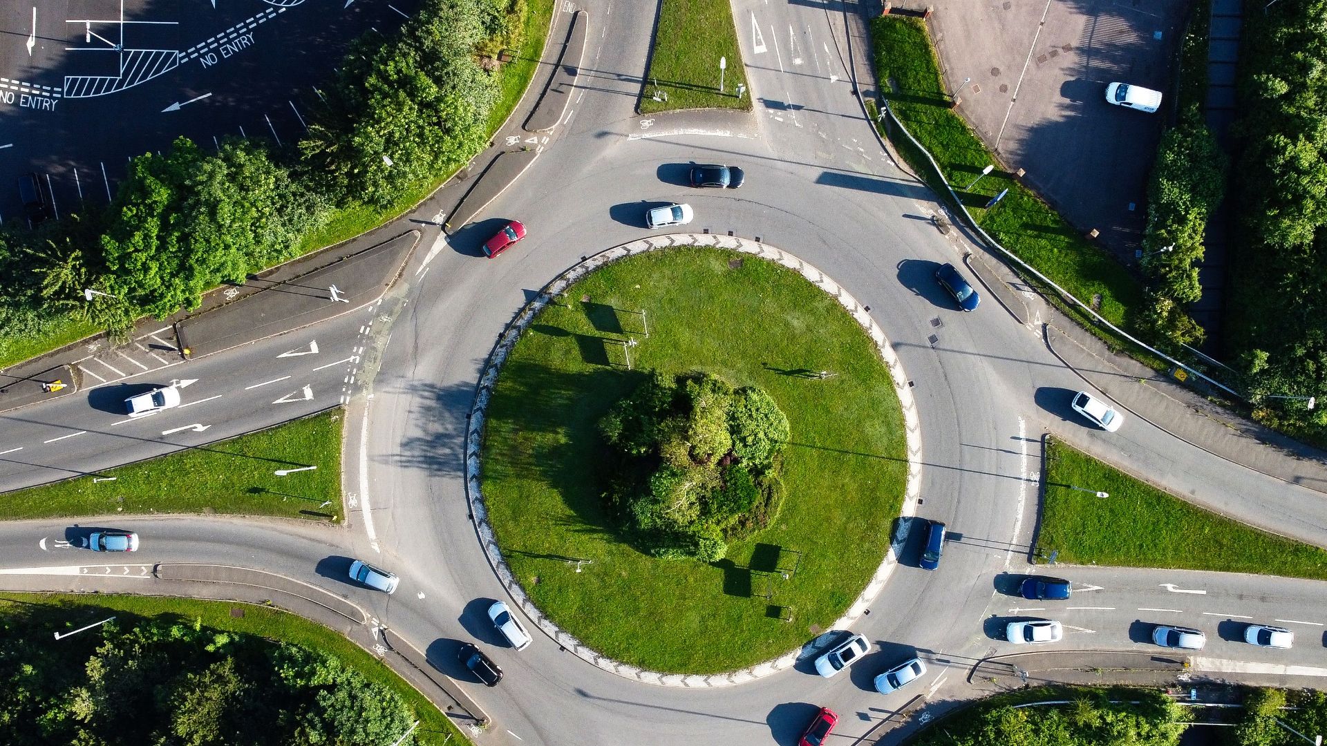Drone shot of a roundabout in Luton, England, showcasing traffic flow.