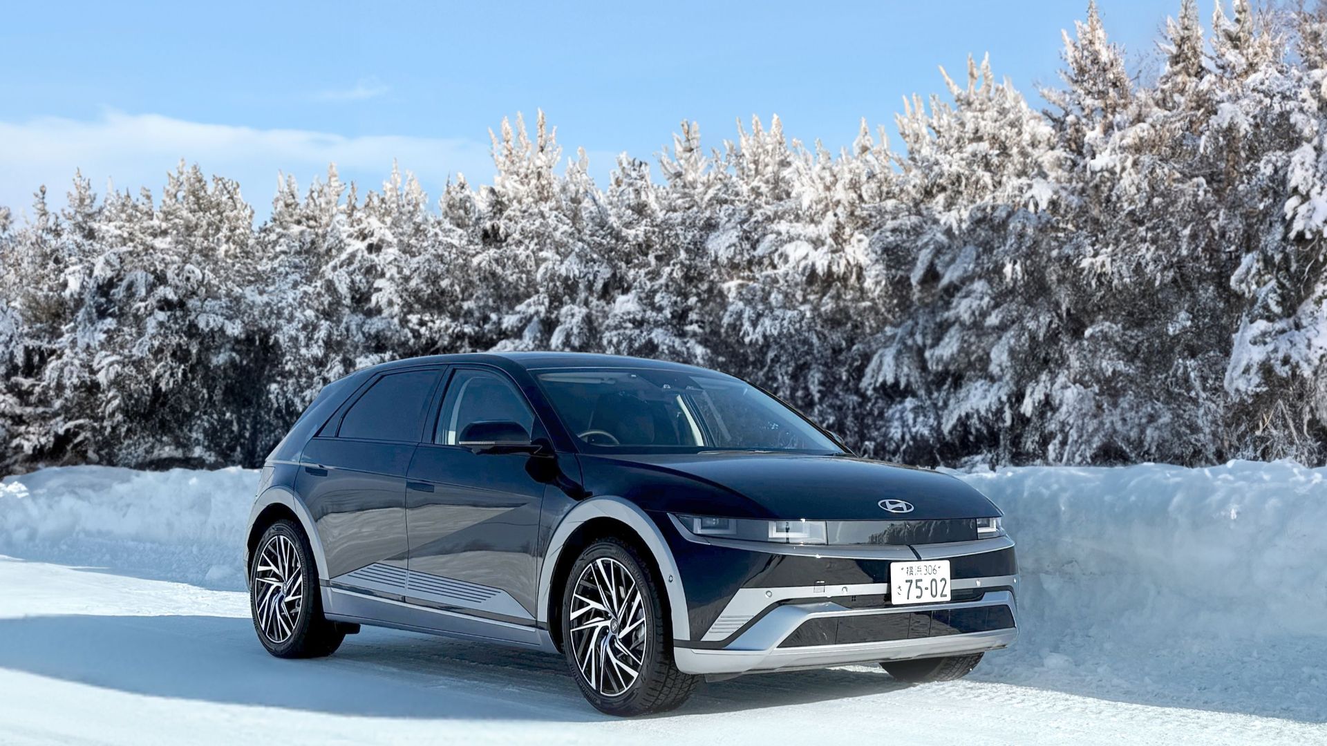 Hyundai Ioniq 5 electric car on a snowy road in Sapporo, Japan.