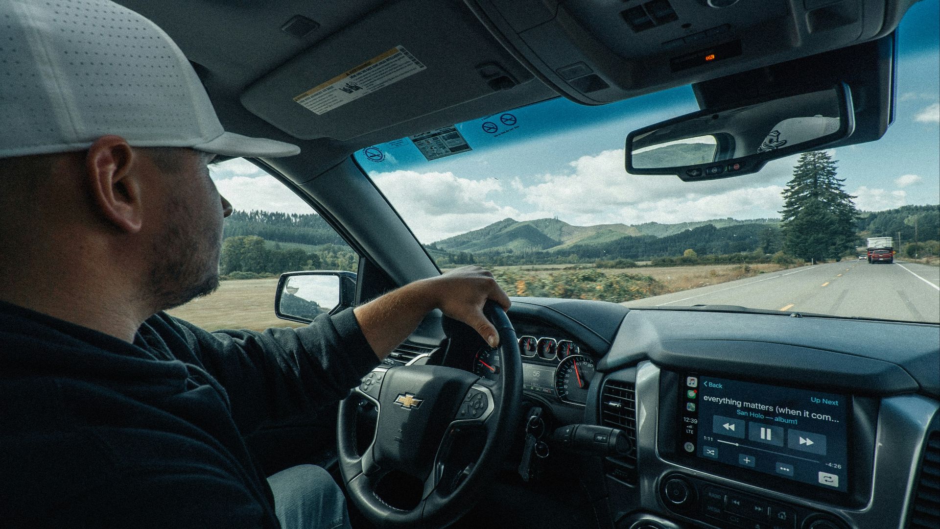 man driving vehicle