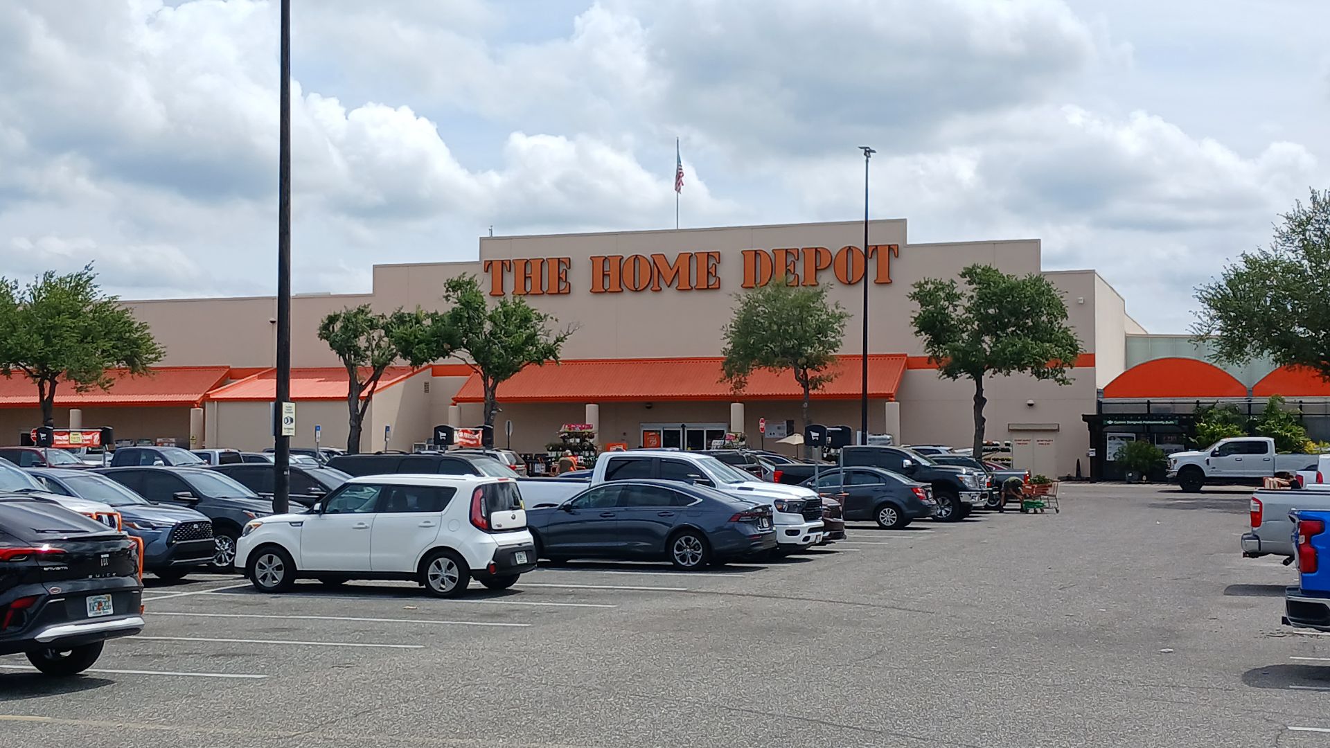The front exterior of a Home Depot store at 8815 N Florida Ave, Tampa, Florida, United States, as seen from the parking lot, on 19 April 2026.