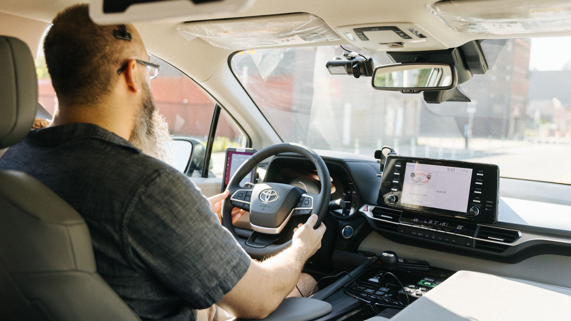 Interior of a May Mobility autonomous Toyota Sienna, with a safety driver, in Detroit