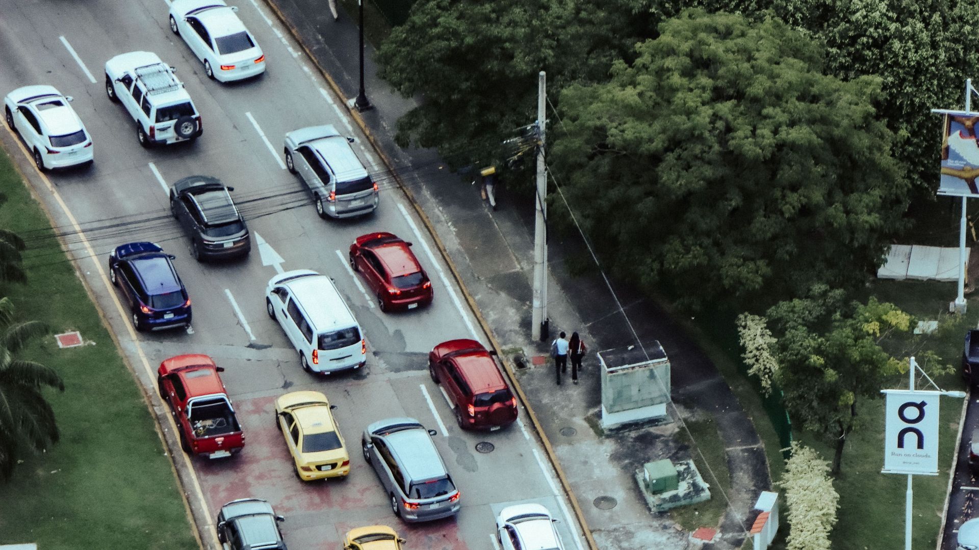 Overhead shot of cars in a traffic jam showcasing urban life and transportation dynamics.