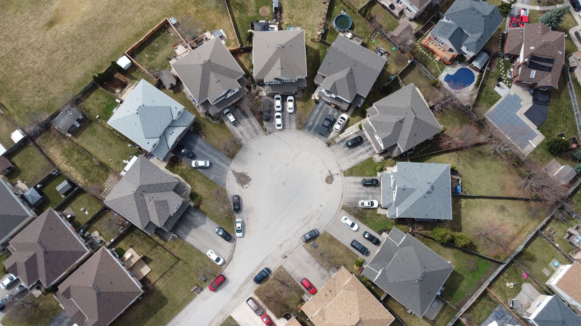 Drone shot of a suburban cul-de-sac in Thorold, Ontario, Canada.