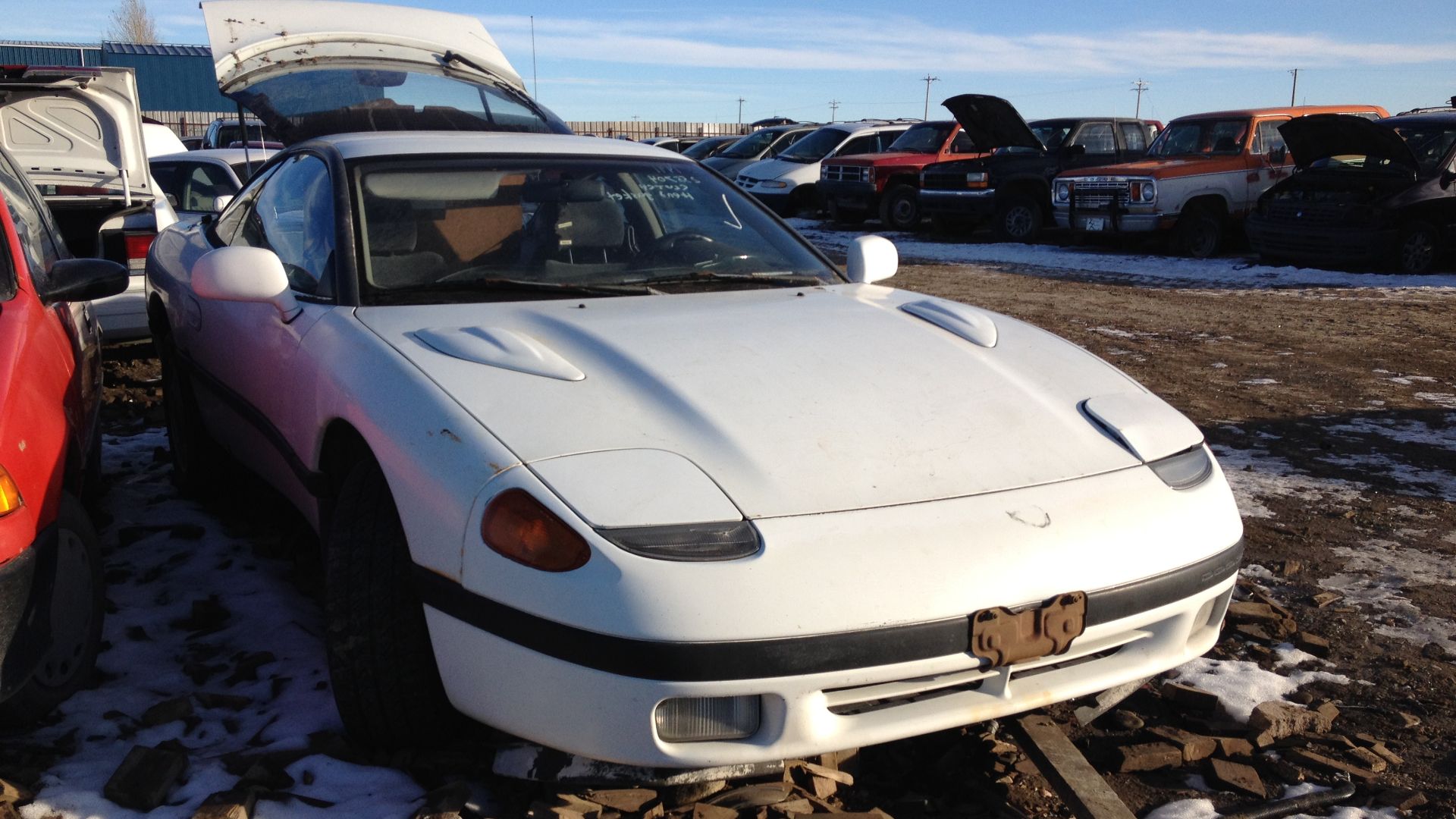 Lower trim level Dodge Stealth in the scrapyard