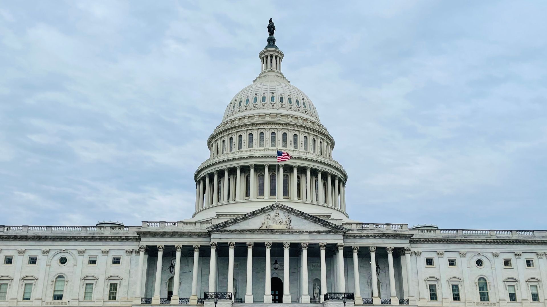 Front view of the iconic US Capitol Building in Washington DC, United States.