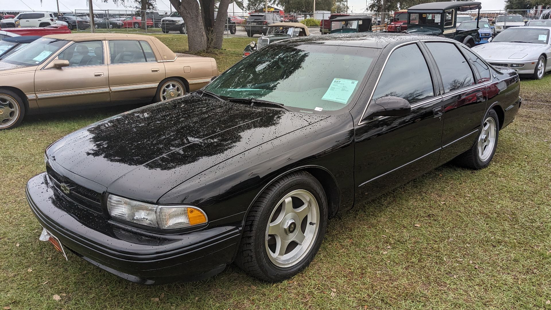 a 1996 Chevrolet Impala SS at Mecum Auctions' Kissimmee 2024 Auction