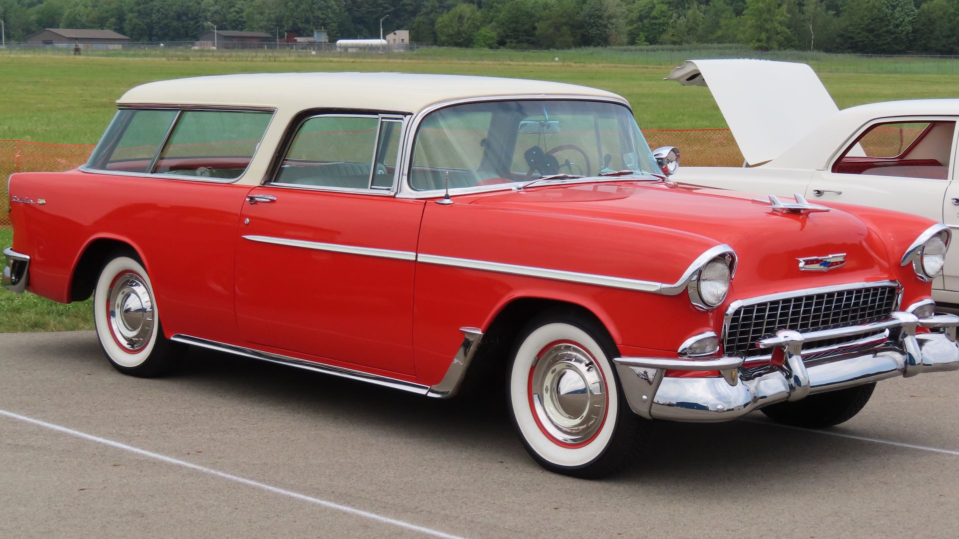 1955 Chevrolet Nomad photographed at the 2023 Youngstown-Warren Regional Airport Wings-n-Wheels event in Vienna Center, Ohio. Finished in India Ivory over Gypsy Red.