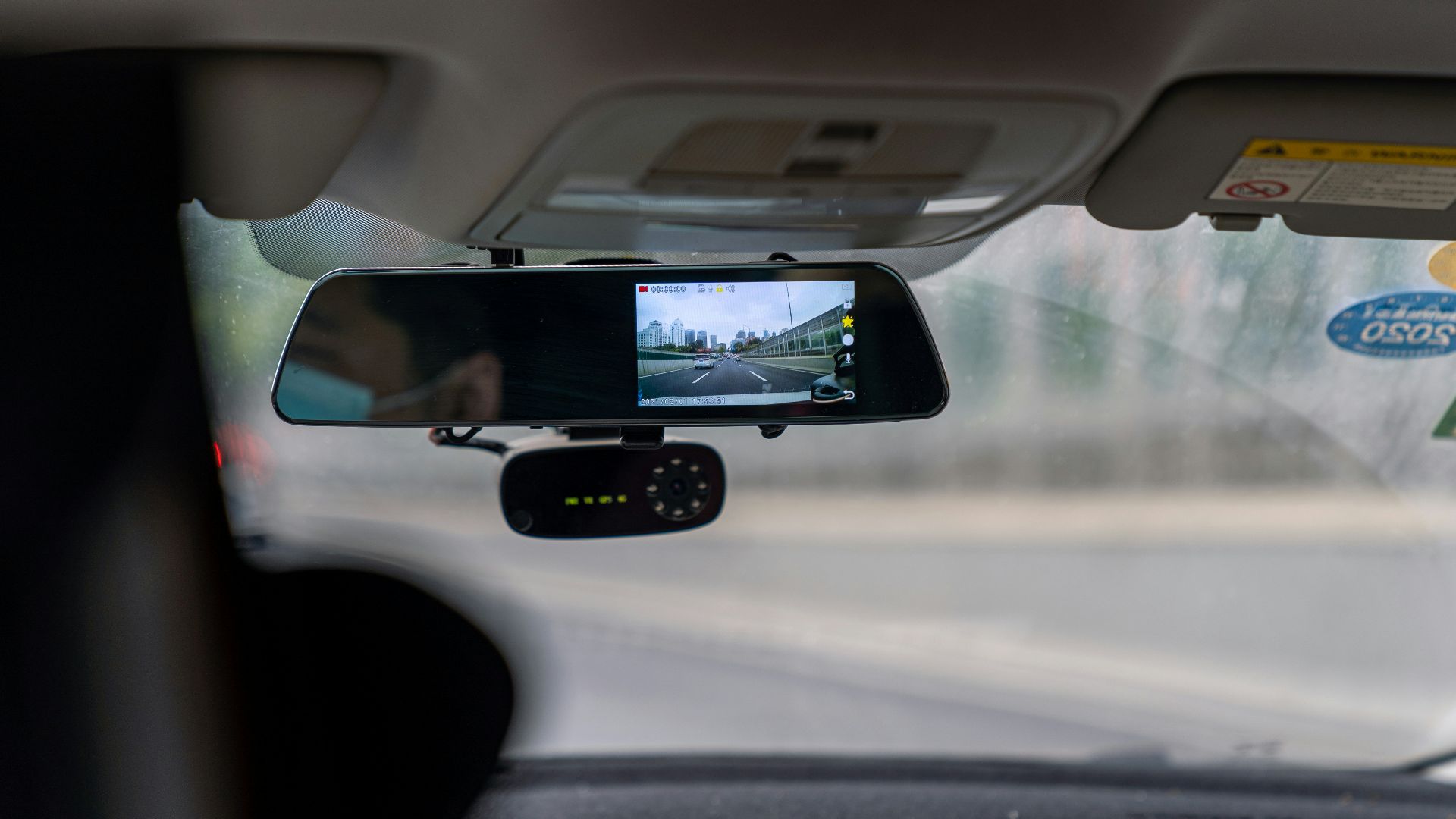 car side mirror with water droplets