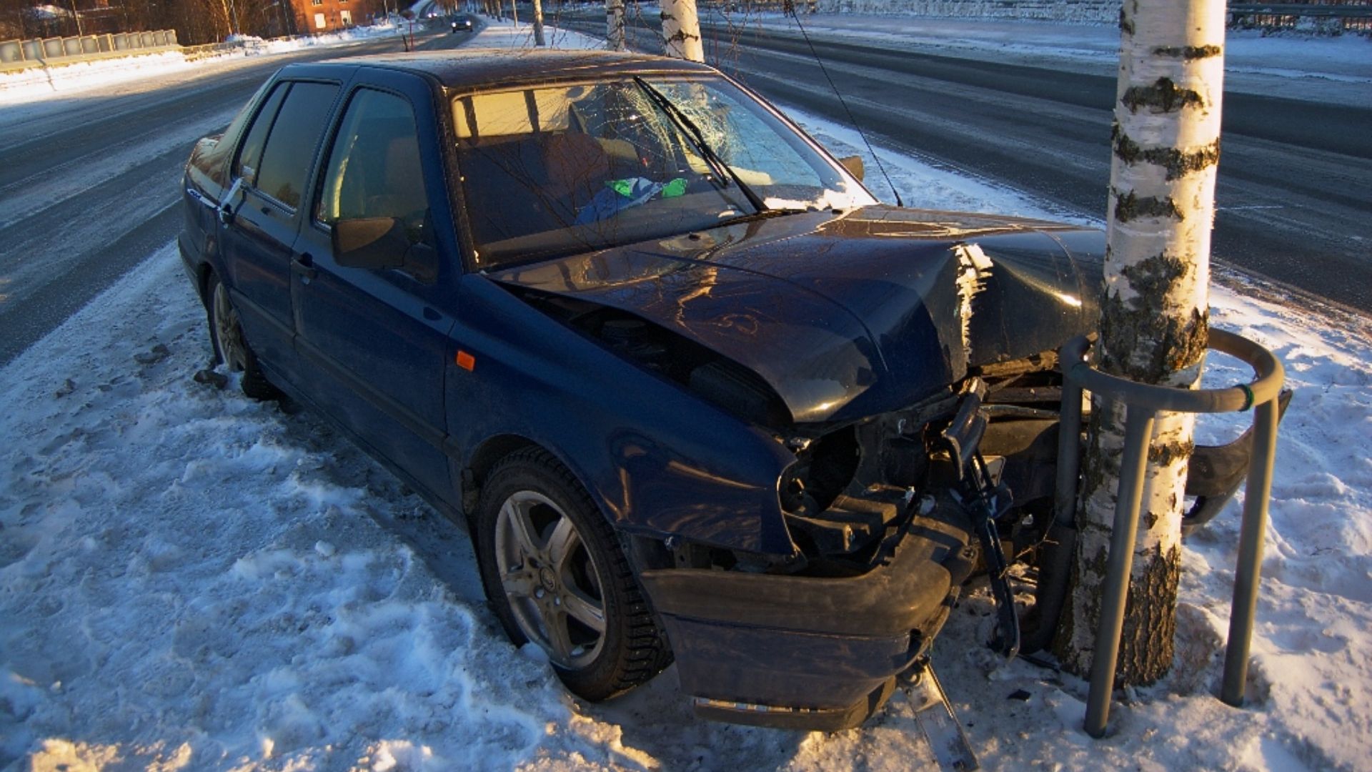Crashed car on the 2nd class main road 75 in Siilinjärvi, Finland