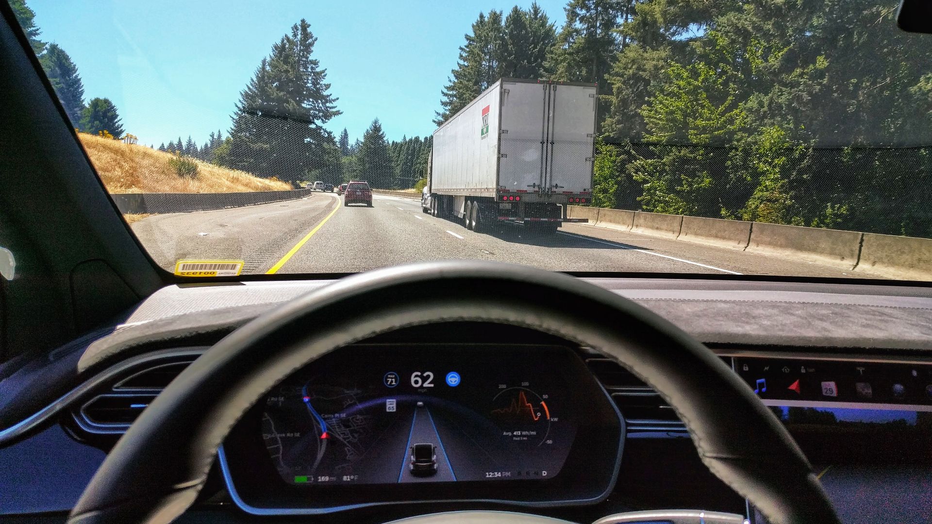 Driving in traffic with Tesla's autopilot controlling distance from the lead car and centering the vehicle in the lane.
Vehicle is a 2017 Model X 75D with dark interior.