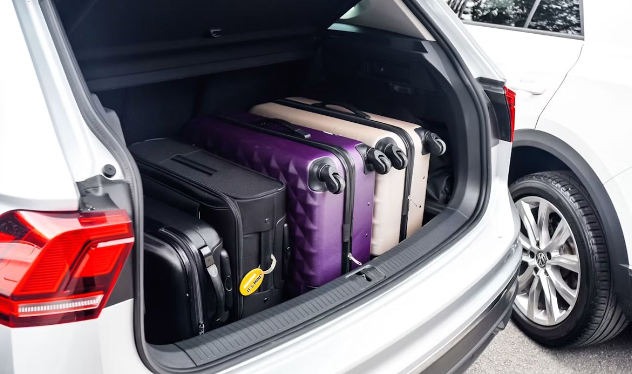 a car with a suitcase in the trunk