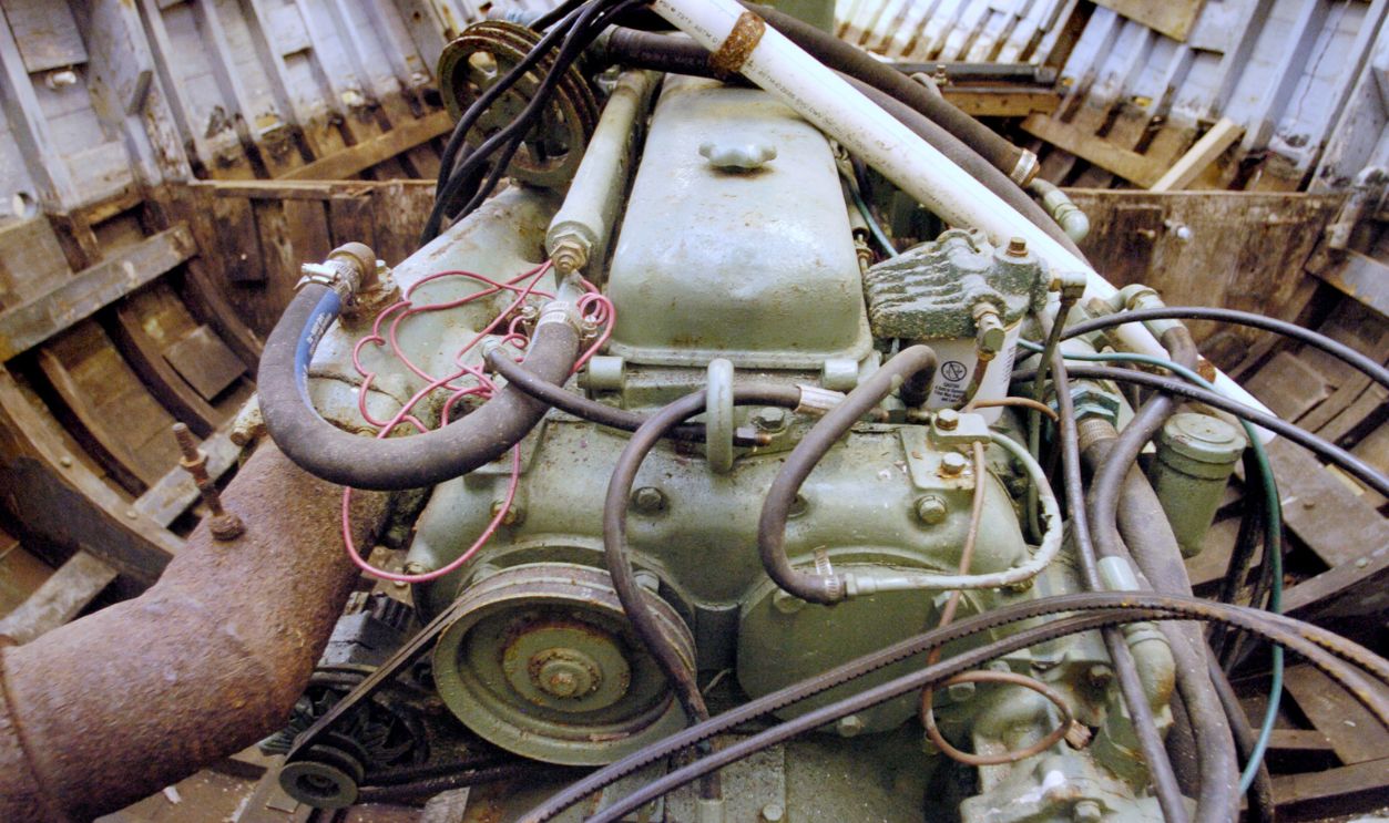 Staff Photo by Derek Davis, Tuesday, October 25, 2005: The original engine of an old, wooden motor lifeboat, originally used by the Coast Guard, that is being restored by Six River Marine in Yarmouth. It is Detroit diesel 4-71 engine. 