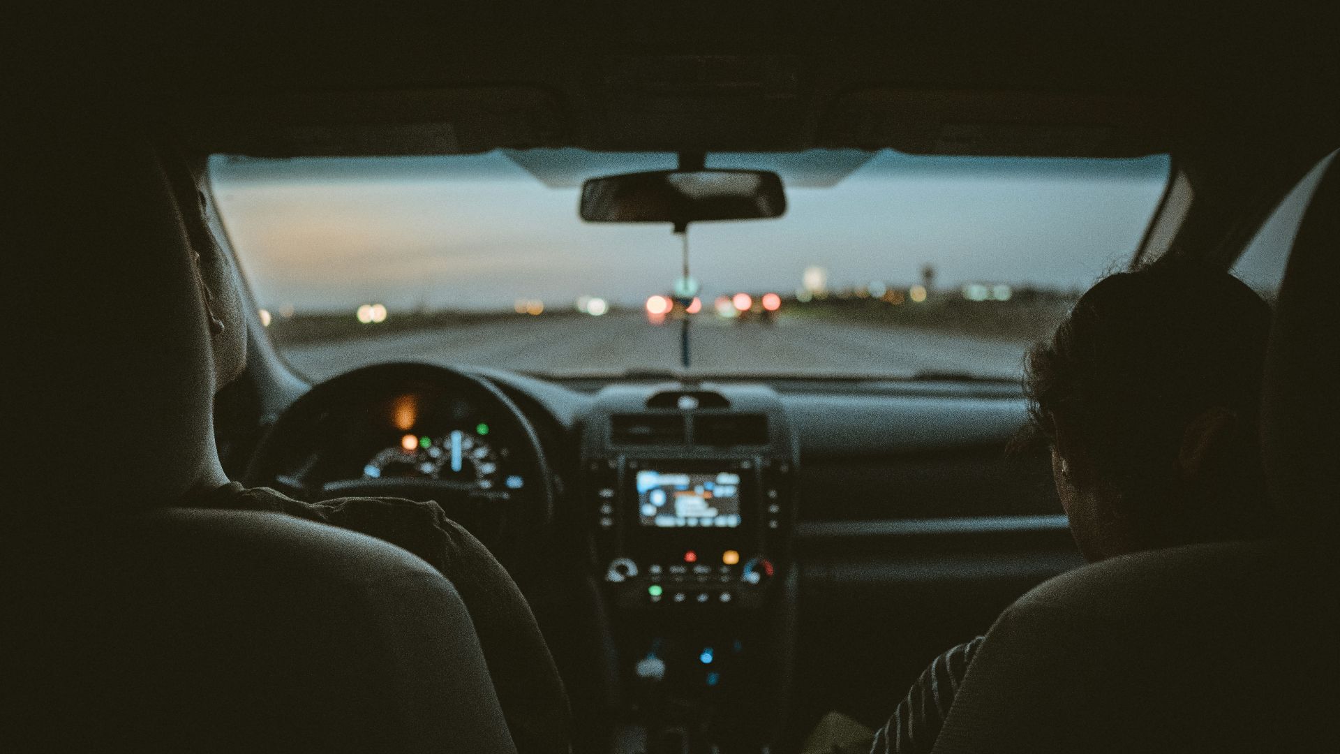person driving car during night time