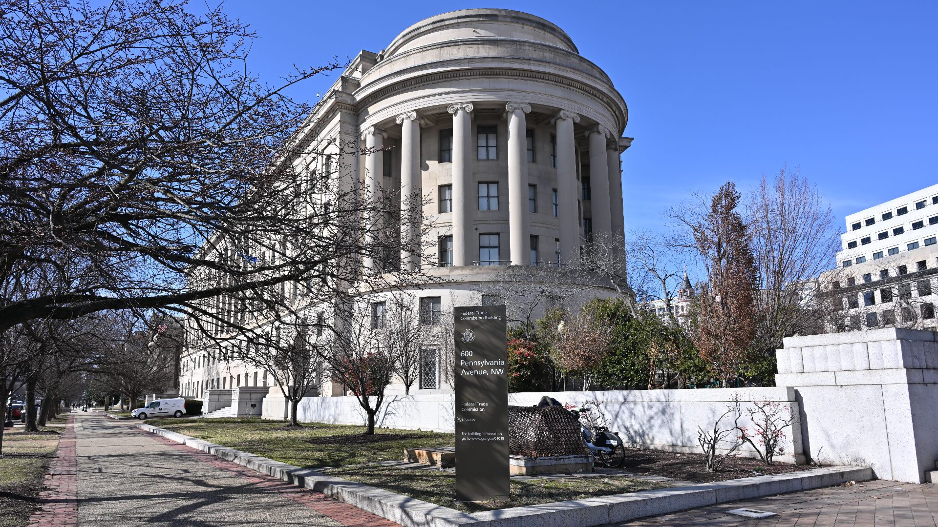 The Federal Trade Commission building is located on a triangle of land bounded by Pennsylvania Ave, Constitution Ave, and 7th St NW.  The building fits into this parcel by having a roughly triangular shape with the narrow end with a  curved corner.  This 
