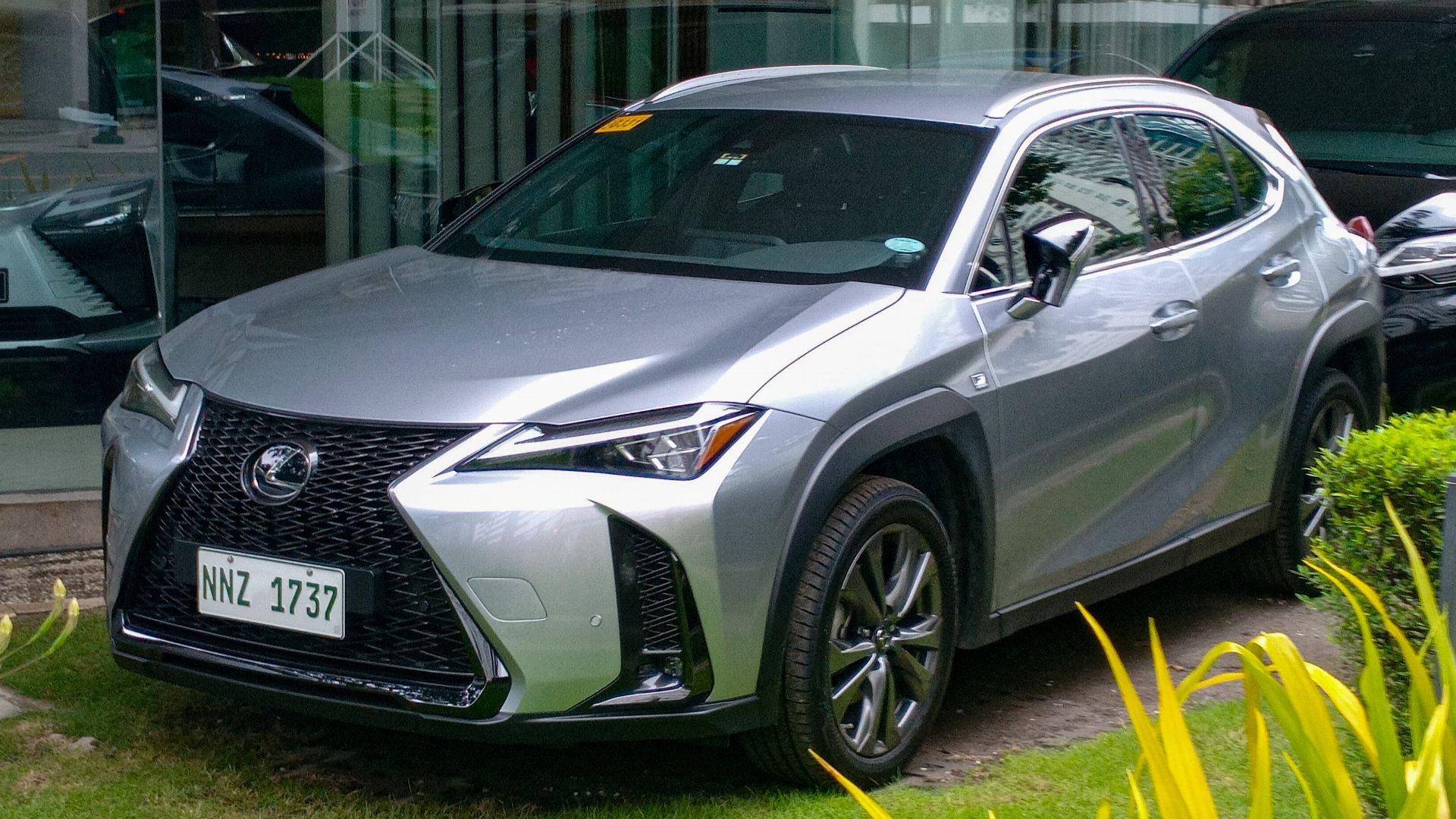 2024 Lexus UX 300h F Sport in Sonic Iridium, parked outside of Lexus Manila Inc.