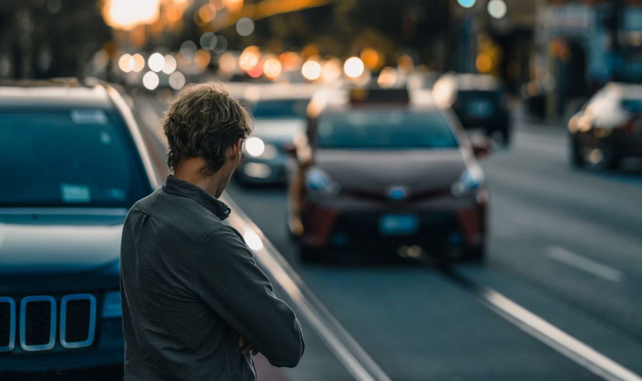 man standing near vehicle