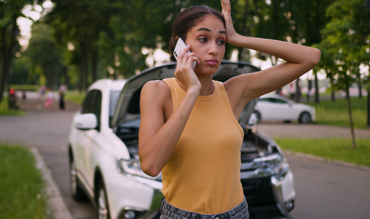 Worried African American woman talking mobile phone smartphone call