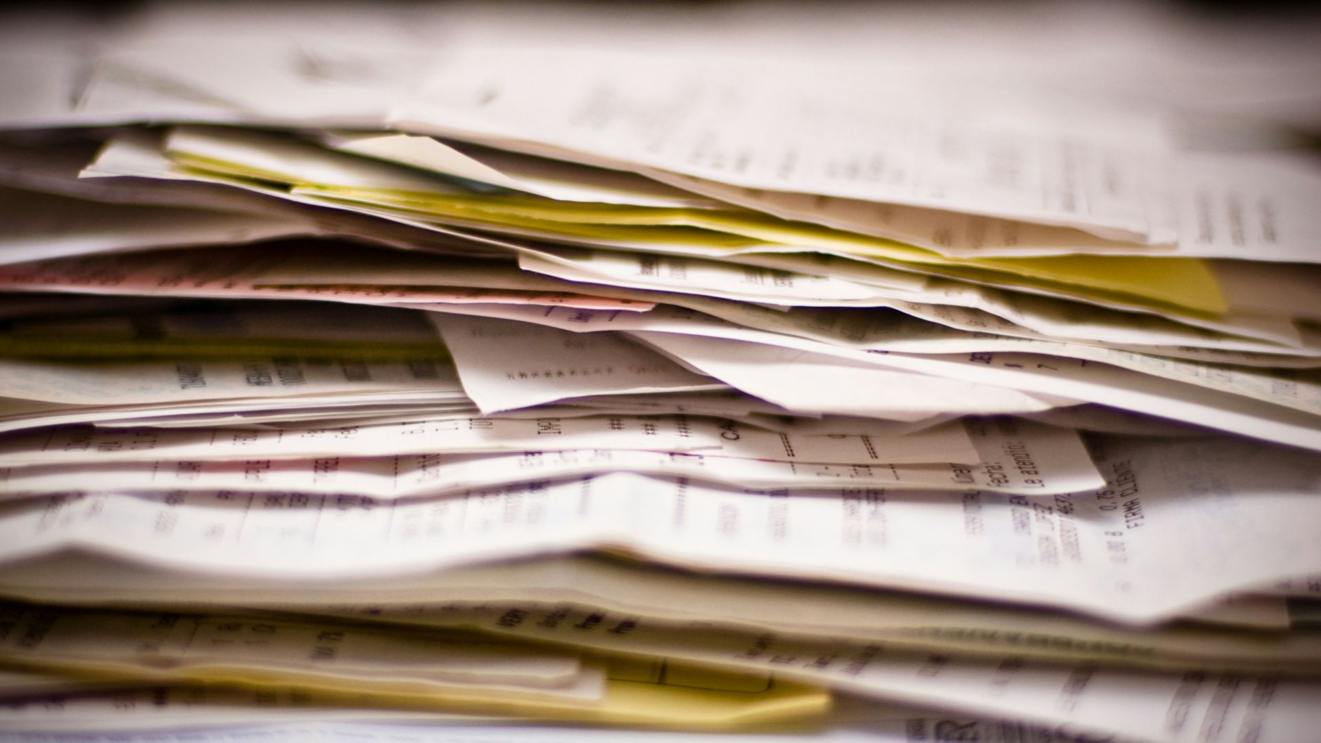 A close-up of a stack of papers.