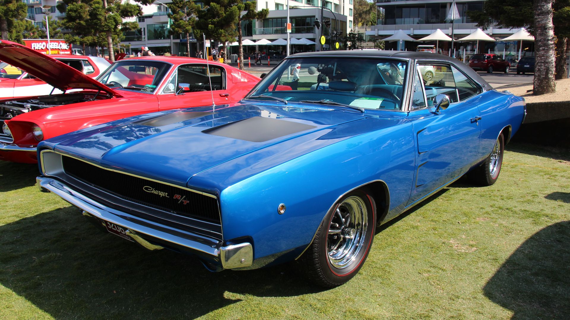 From 1966 the B Body Dodge (same platform as the Plymouth Belvedere and Satellite) was available as the general Coronet or the 2 door muscle car, the Charger. It was redesigned in 68 loosing the fastback and getting a 'coke bottle' shape with scallops in