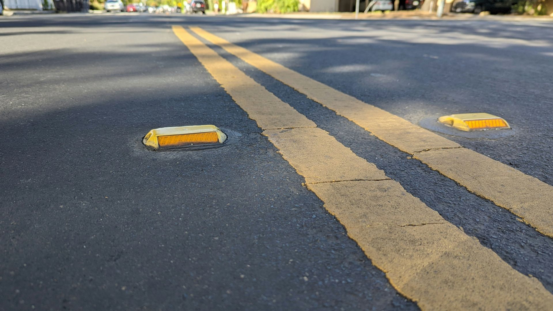 a road with yellow tape on it