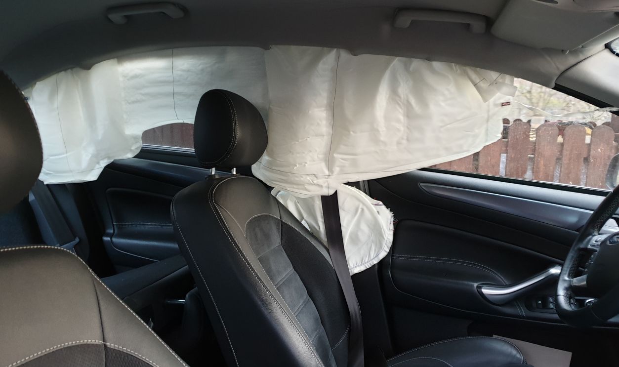 Cluj-Napoca,Cluj/Romania-14.11.2019 - Curtain airbags triggered as a result of a lateral impact on the driver's side