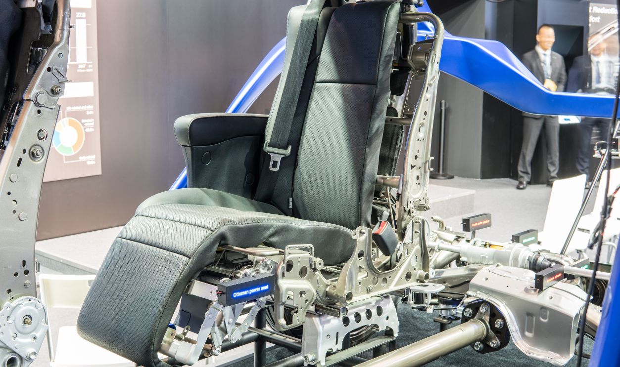 Frankfurt, Germany, September 13, 2017: AISIN Seiki Co - Cross section of the modern car with parts at 67th International Motor Show (IAA)
