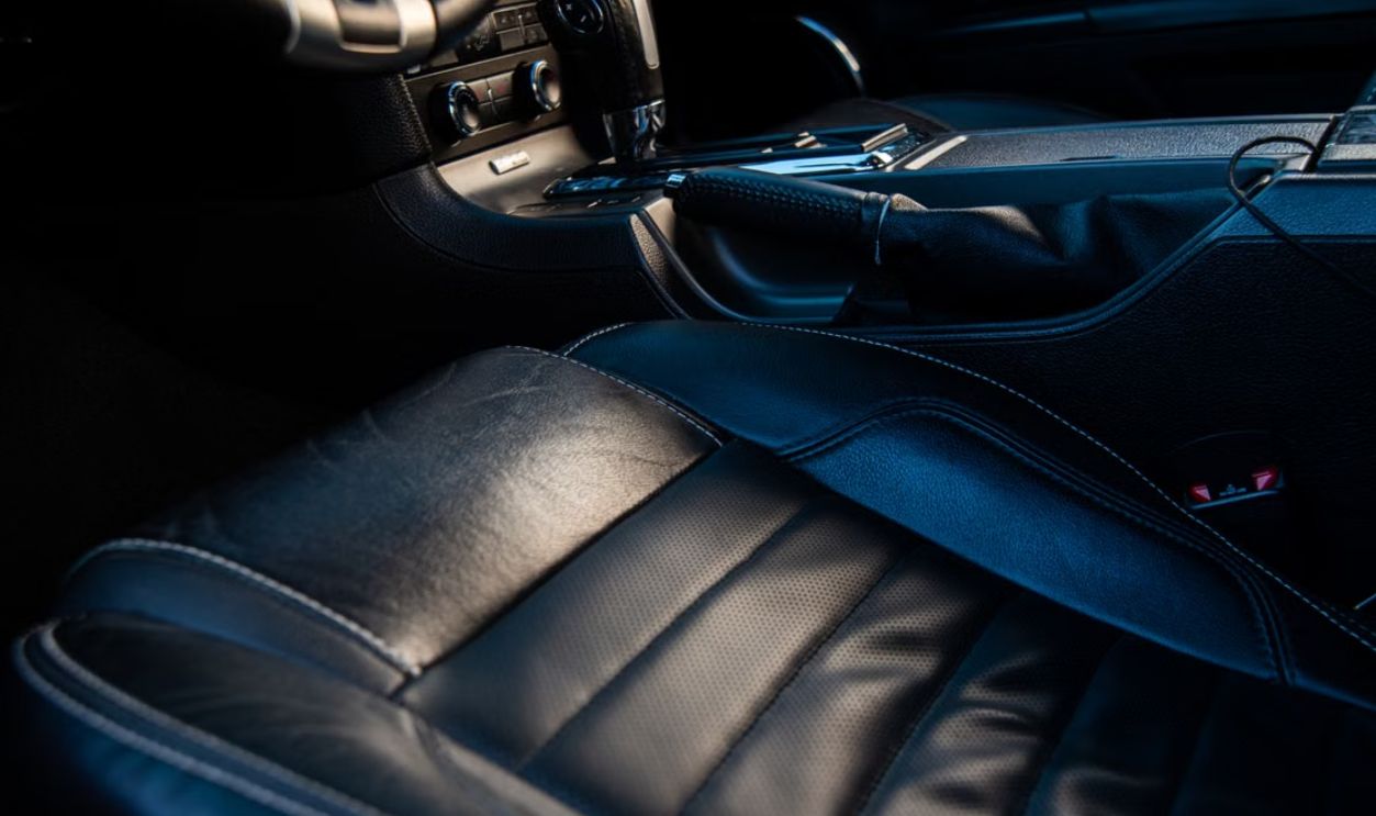 Close-up of a luxurious car interior with leather seating, showcasing style and comfort
