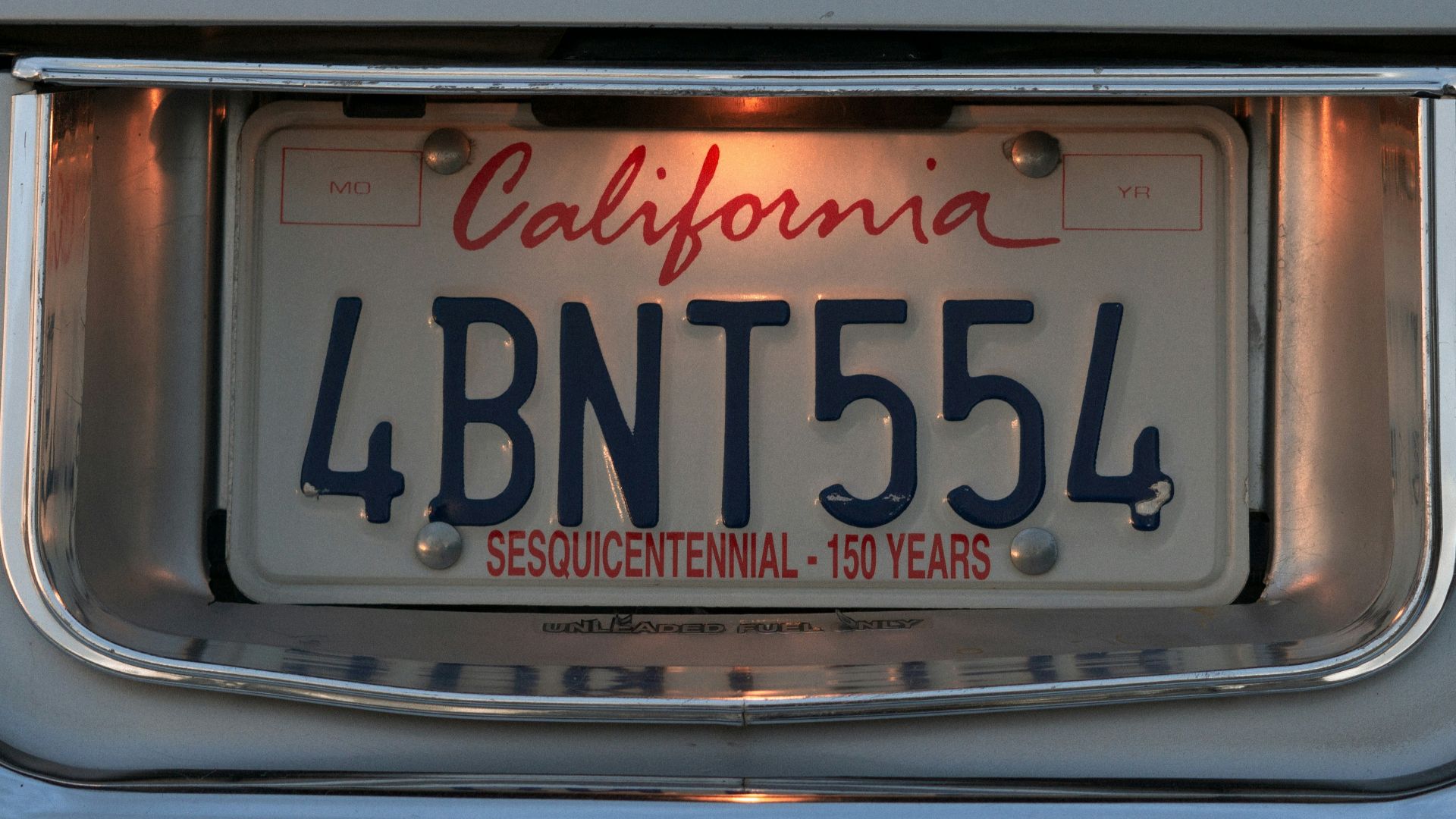 A california license plate with the word california on it