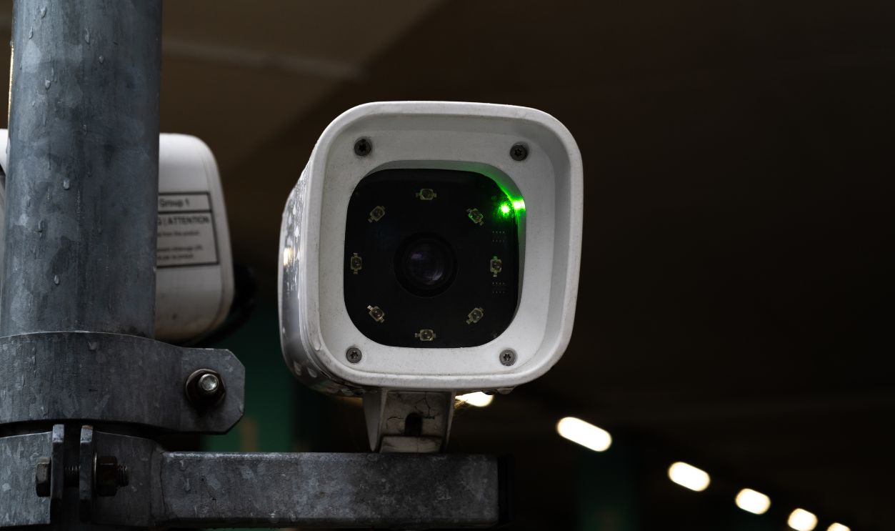License plate reader, automatic number recognition, digital surveillance camera, boom barrier gate. Smart parking lot entrance pass automation. Vehicle access control. Car park identification system.