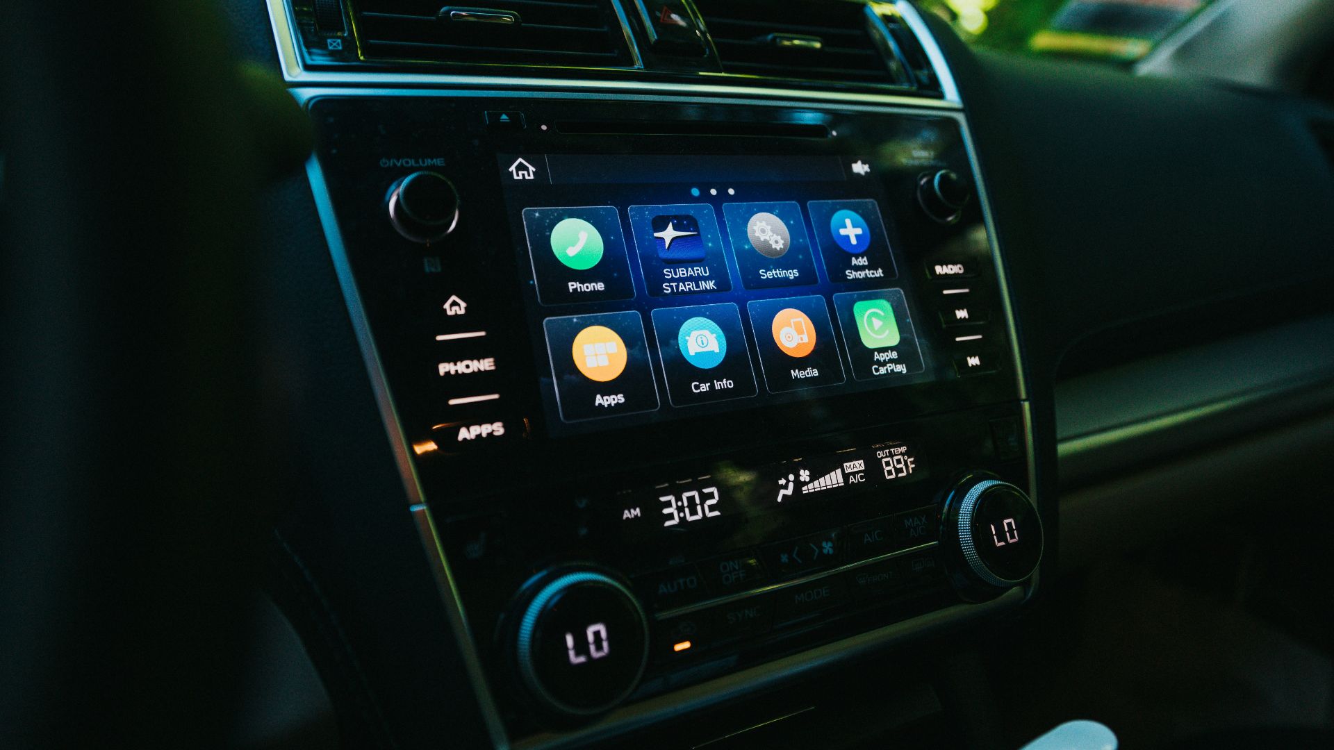 black car stereo turned on during daytime