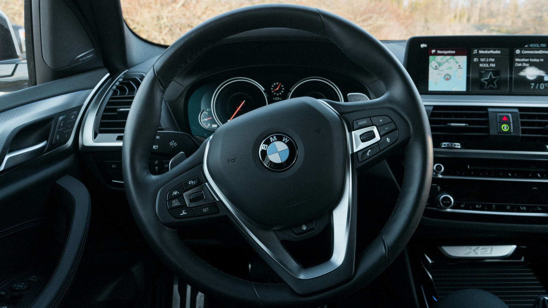black BMW steering wheel