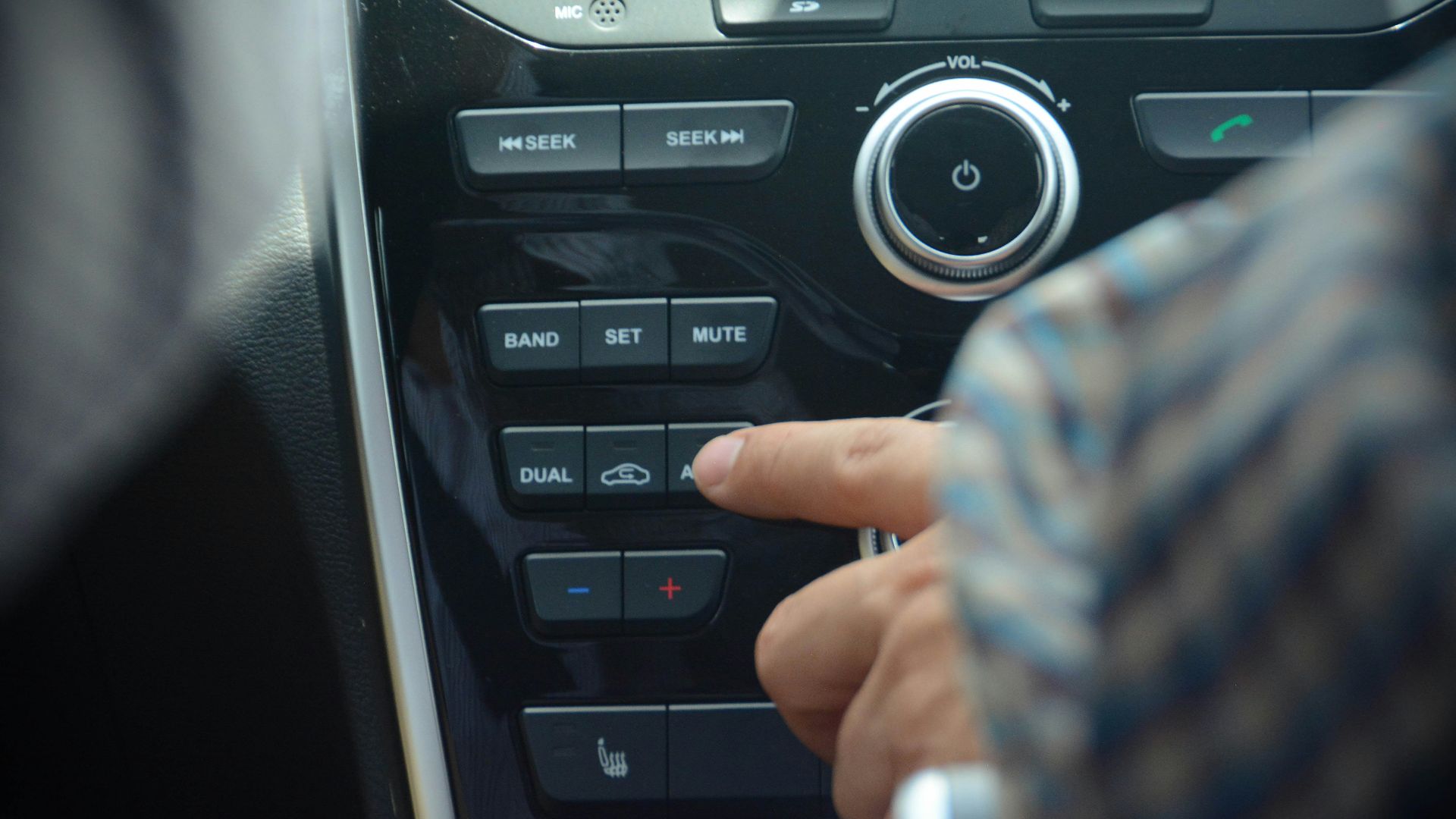 a person holding a remote control