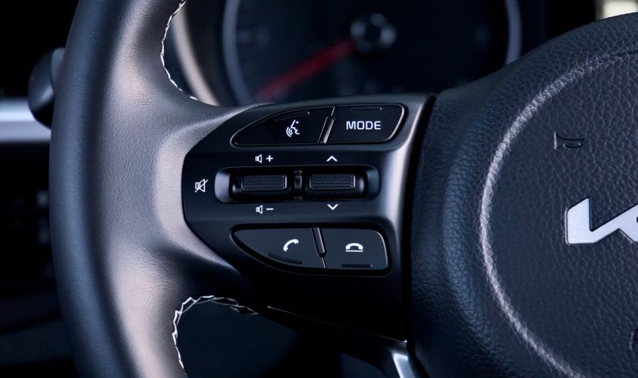 Detailed view of Kia Picanto steering wheel buttons focusing on control features