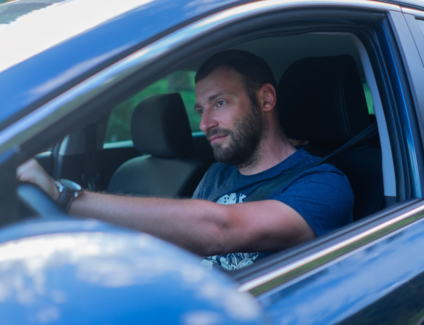 bearded-man-driving-a-car