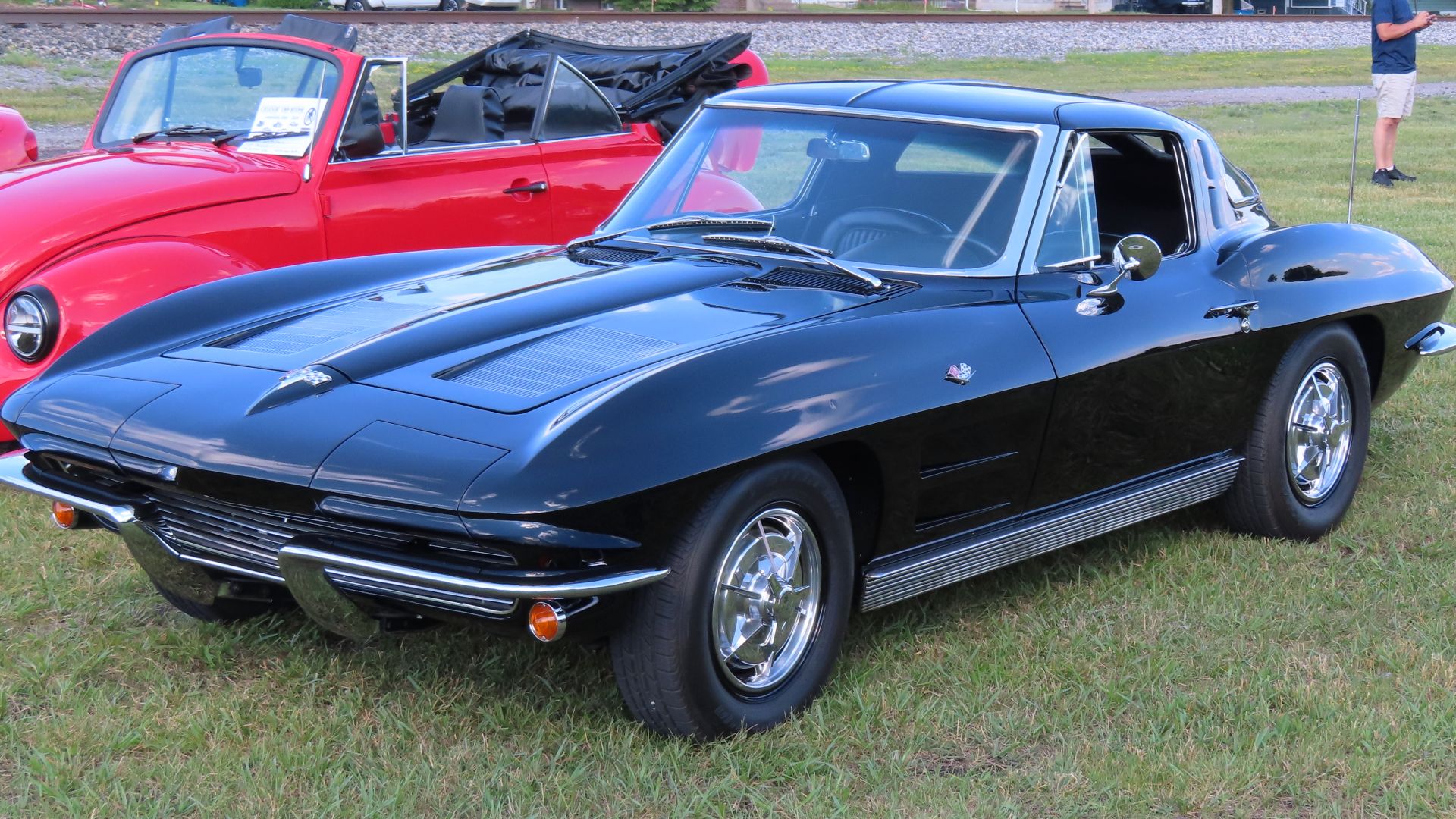 1963 Chevrolet Corvette Sting Ray Sport Coupe photographed at the June 24th, 2024 Cruisin' the River Lowellville car show in Lowellville, Ohio. Finished in Tuxedo Black.