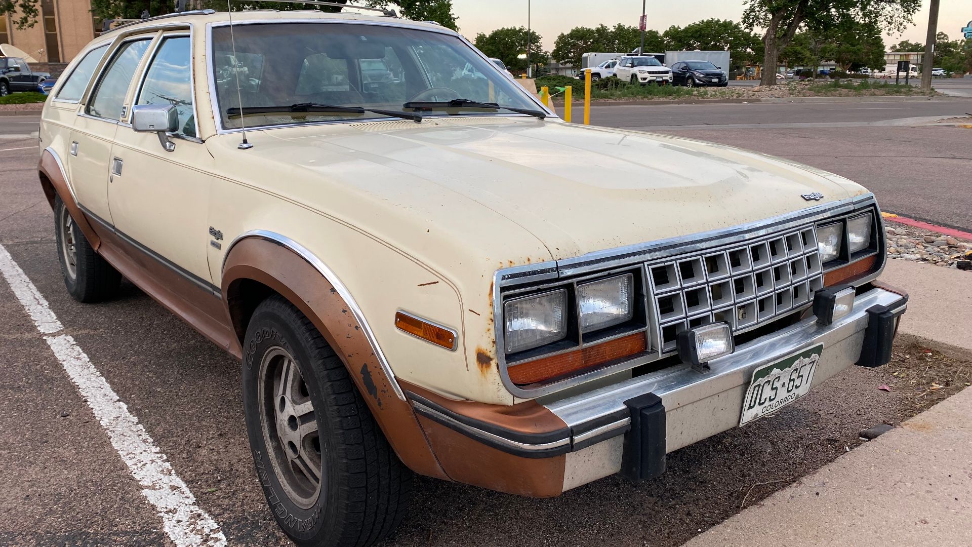 1987 AMC Eagle four-door station wagon with rear liftgate for cargo area access. The innovative compact-sized, fully automatic all-wheel-drive passenger vehicle made by American Motors Corporation (AMC). It had comfort, convenience, and luxury features. T