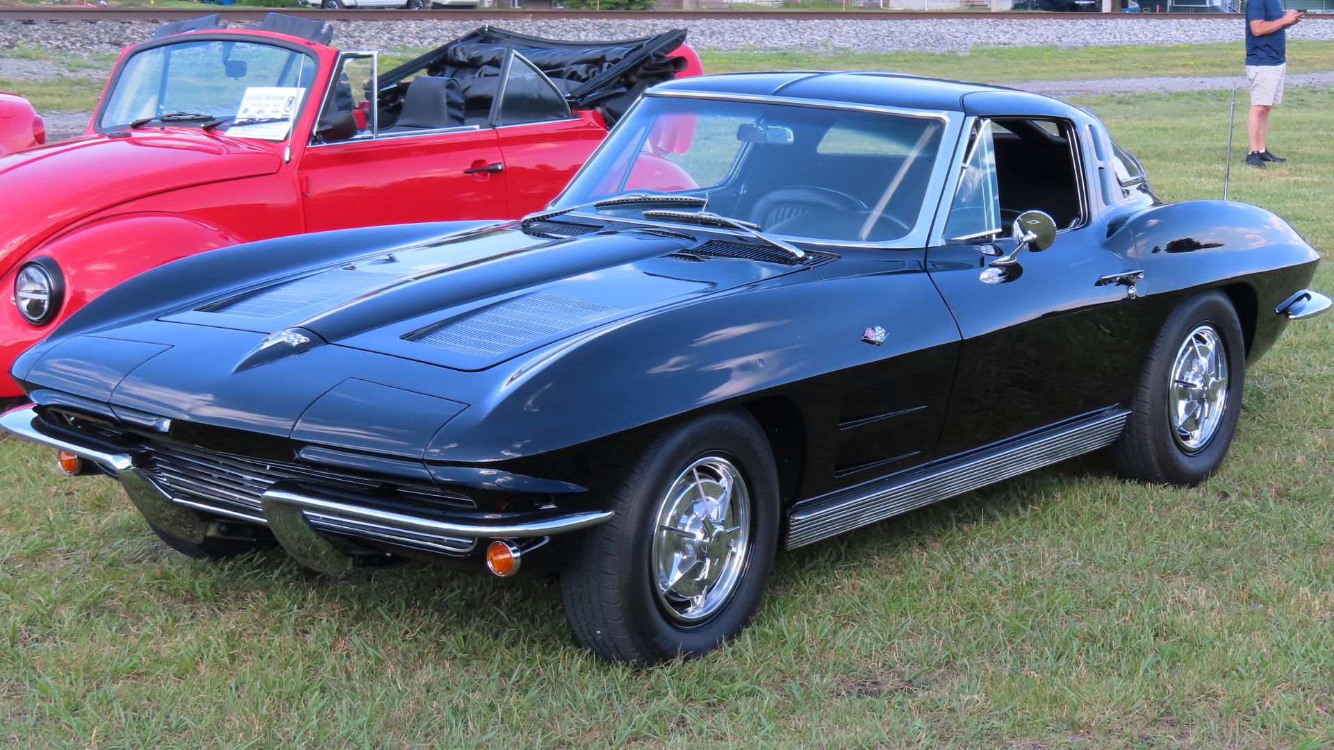 1963 Chevrolet Corvette Sting Ray Sport Coupe photographed at the June 24th, 2024 Cruisin' the River Lowellville car show in Lowellville, Ohio. Finished in Tuxedo Black.