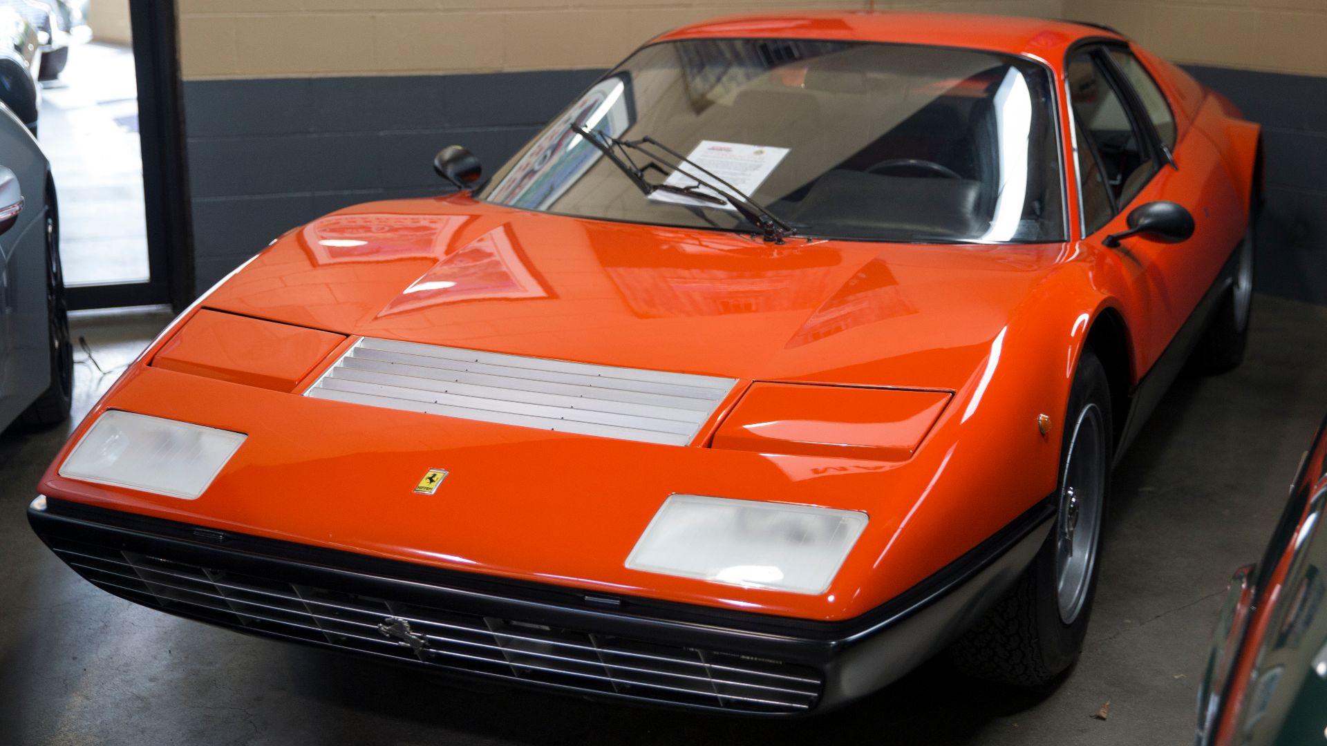 A 1974 Ferrari 365 GT/4 BB Berlinetta Boxer in Dino Rosso at Autosports Designs in Huntington, NY (Long Island). Delivered new on 24 February 1975 to dealers Motor S.p.A. di Carla Allegretti e C., the car spent most of its life in Bologna. Came to the US 