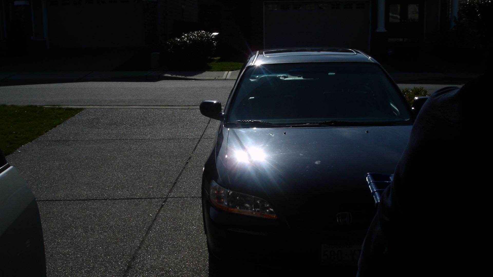 Reflection of sun in car