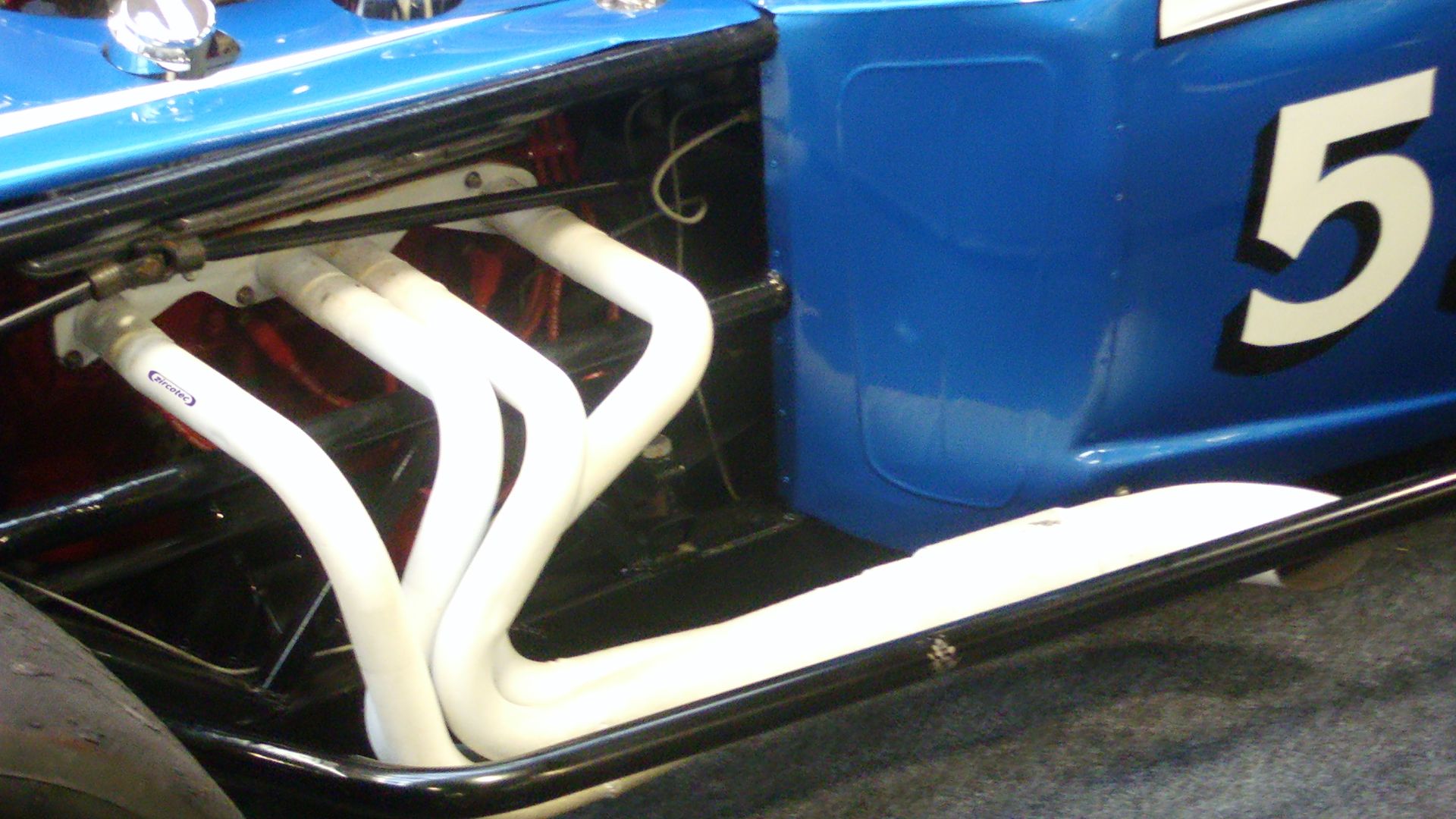 Aftermarket headers with ceramic coating insulation