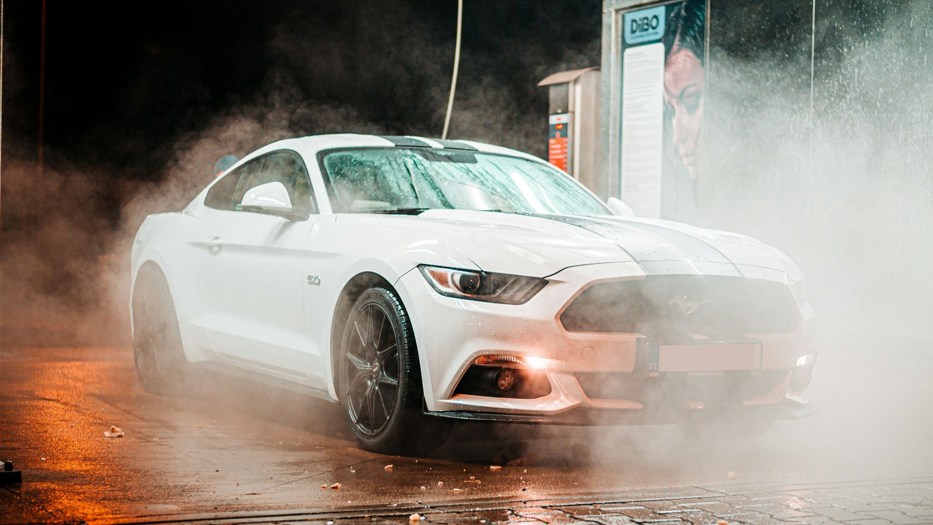 white Ford Mustang coupe