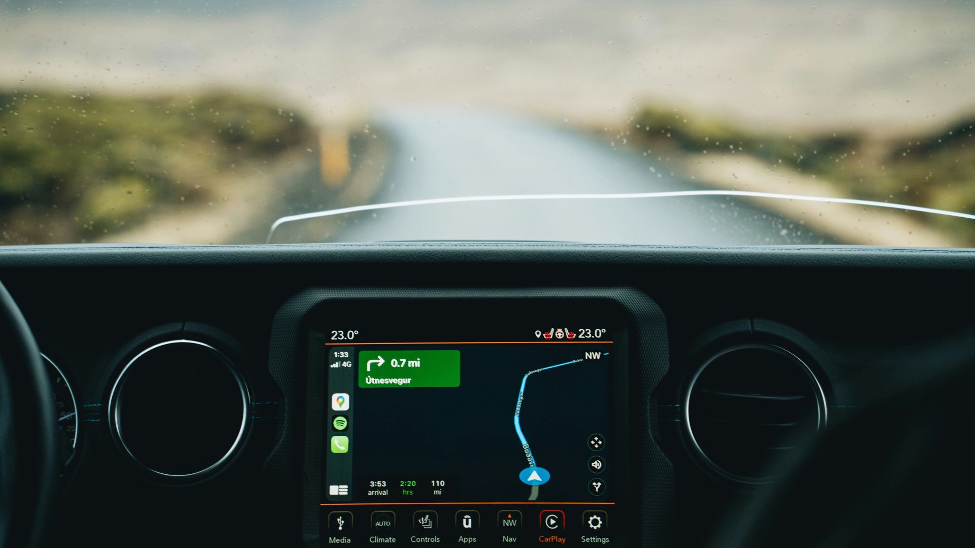 the dashboard of a car with a gps device