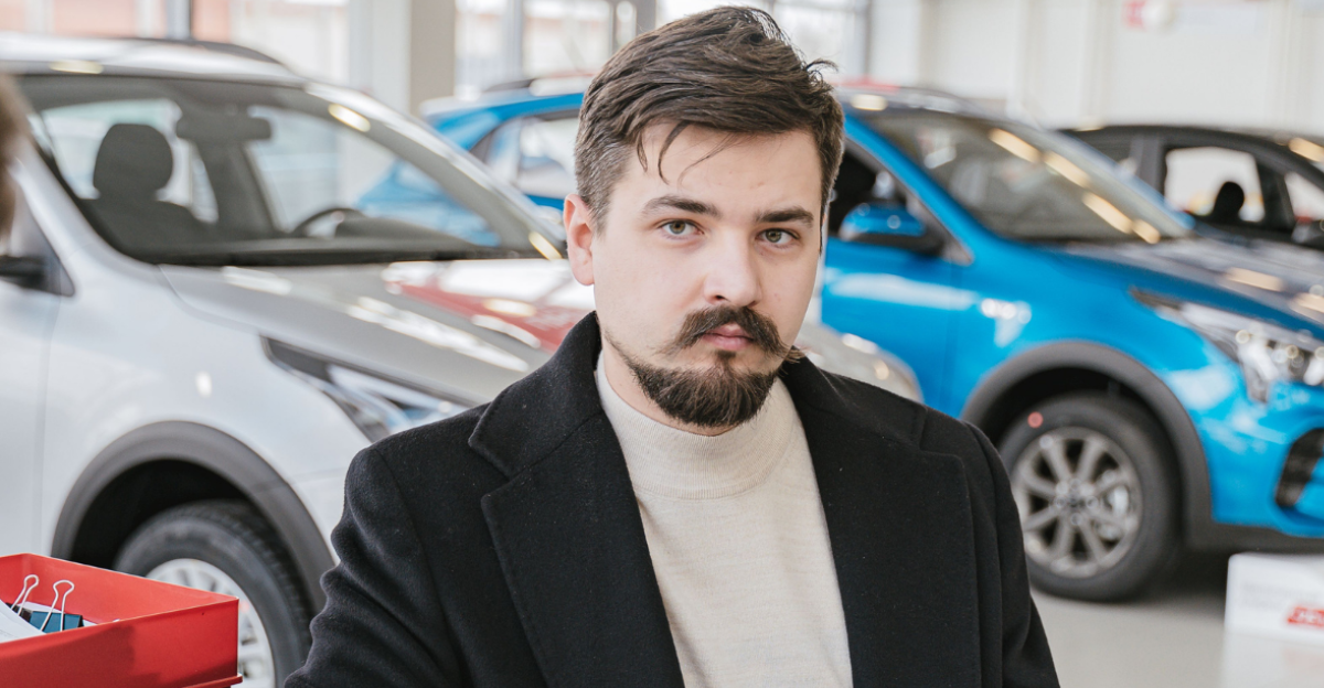 a-man-in-a-car-dealership