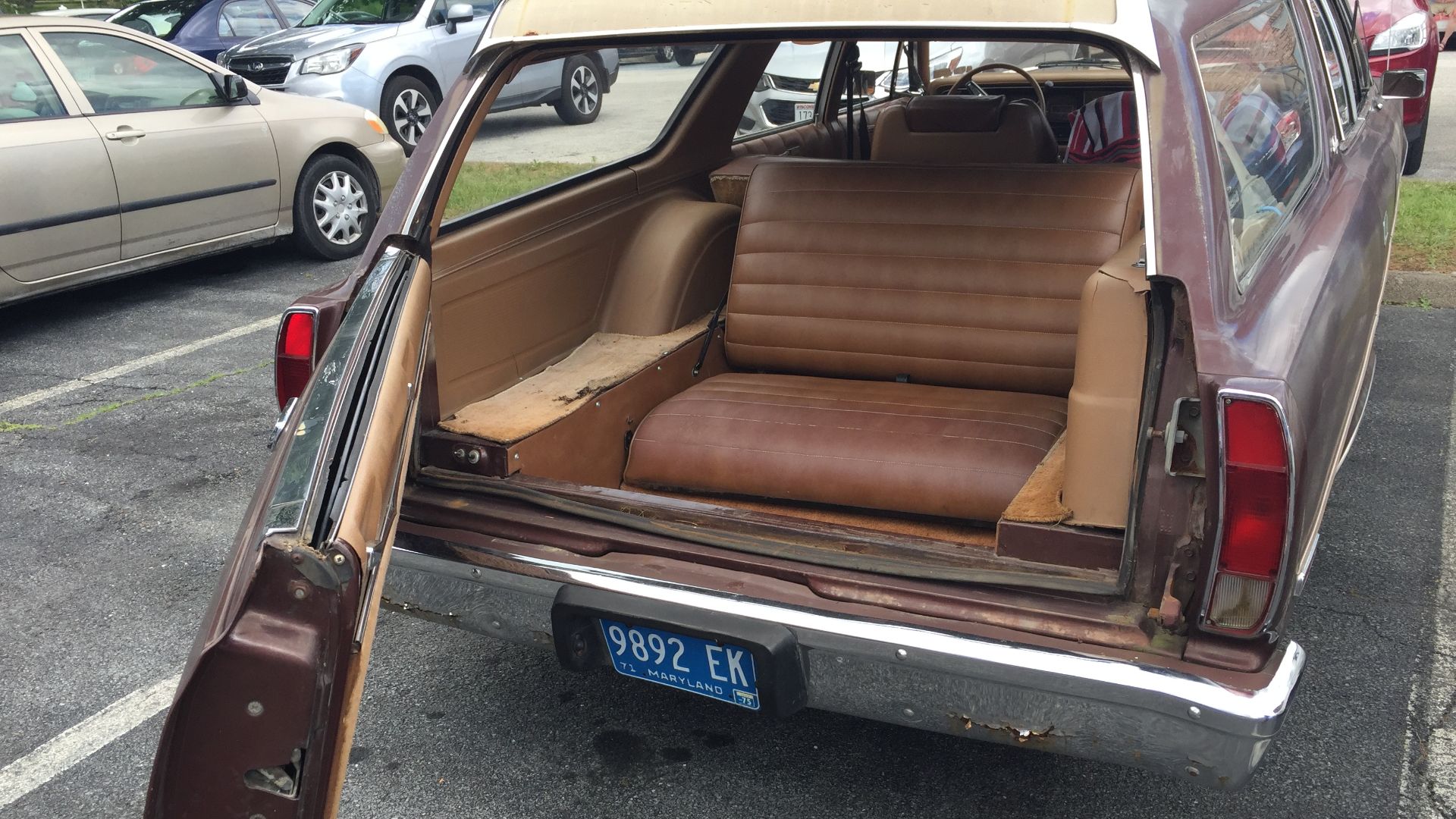 1975 AMC Matador four-door station wagon with room and comfort for eight adult passengers. A large-sized car built by American Motors Corporation (AMC). This car is finished in brown or Cocoa Metallic with a tan interior. It has three rows of seats and th
