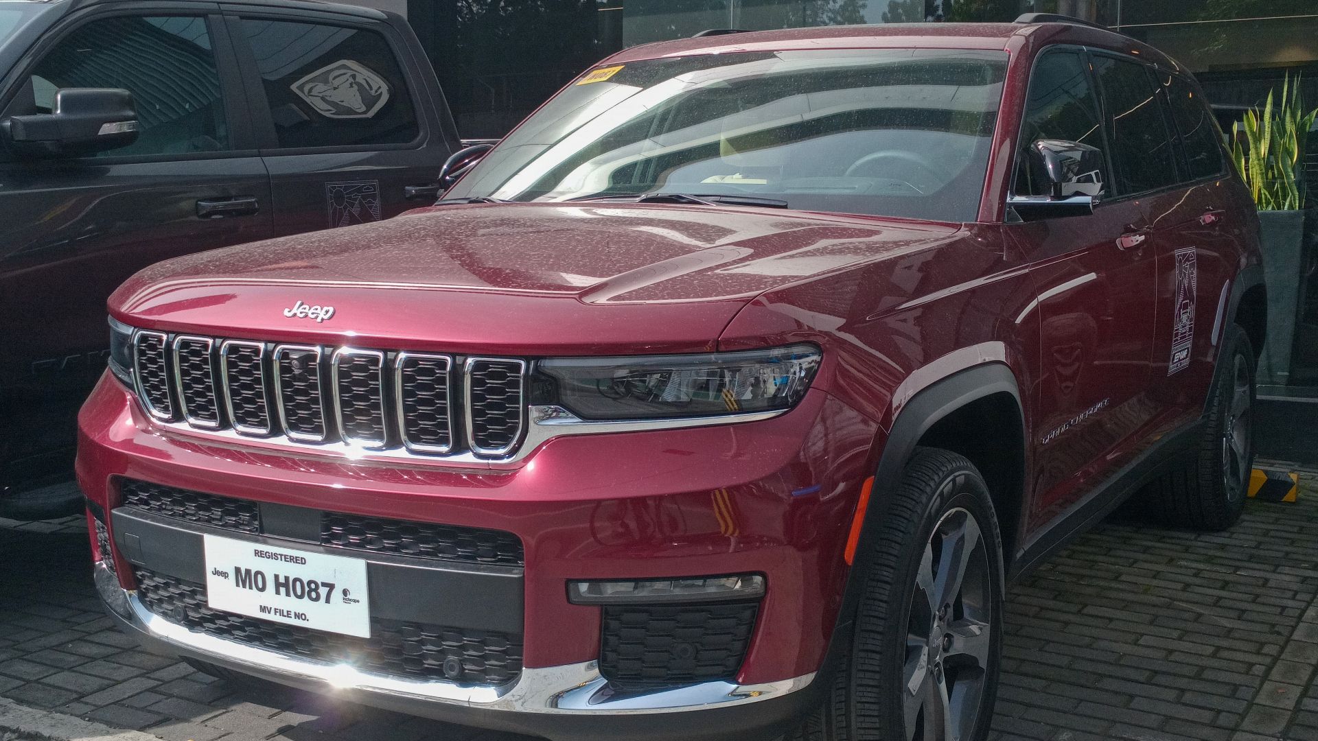 2023 Jeep Grand Cherokee Limited in Dark Garnet Red Pearl.