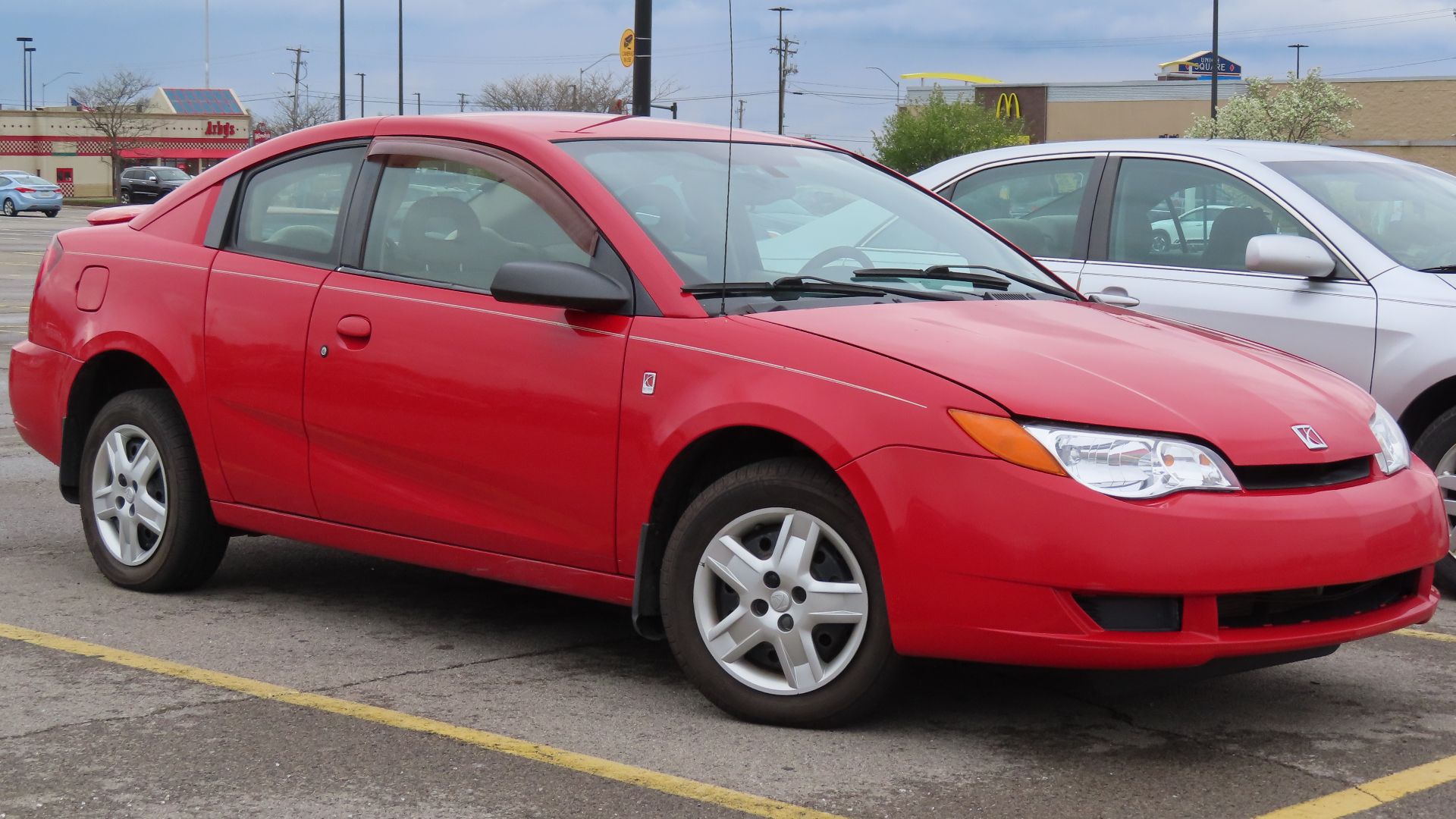 2006 Saturn ION•2 Quad Coupe photographed in New Castle, Pennsylvania. Finished in Chili Pepper Red.