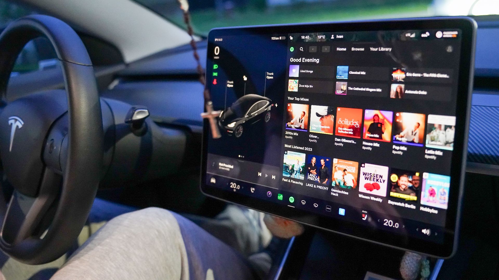 Close-up of a Tesla's digital dashboard showcasing entertainment options in Garešnica.