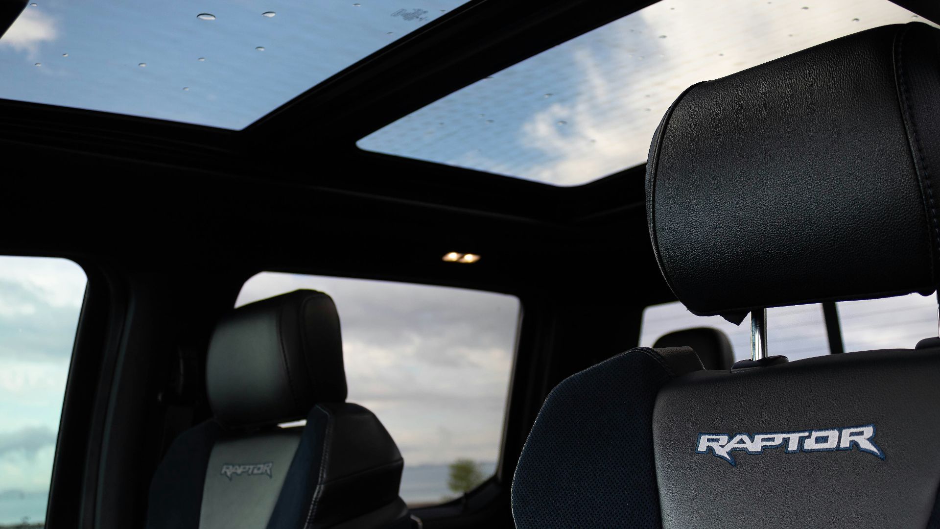 the interior of a car with the seats up