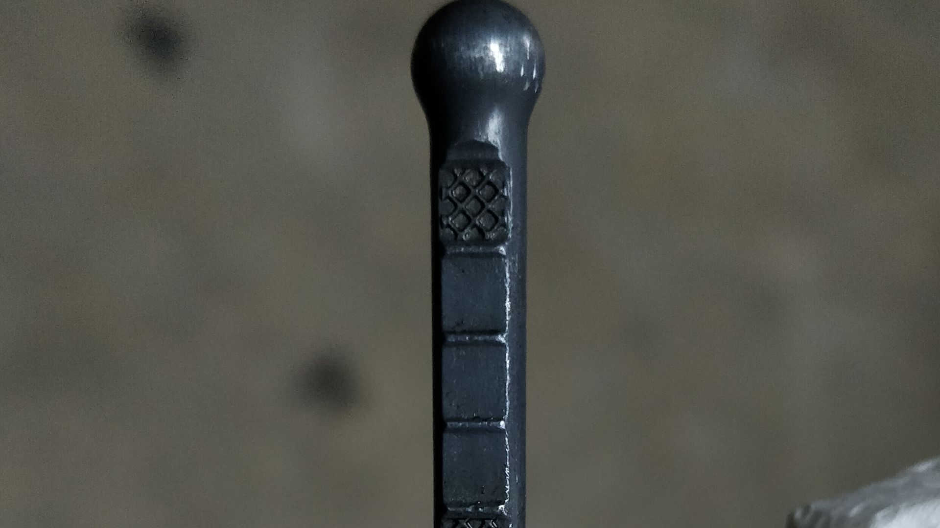 A detail from the end (wiped) of the oil dipstick of an Opel Astra K